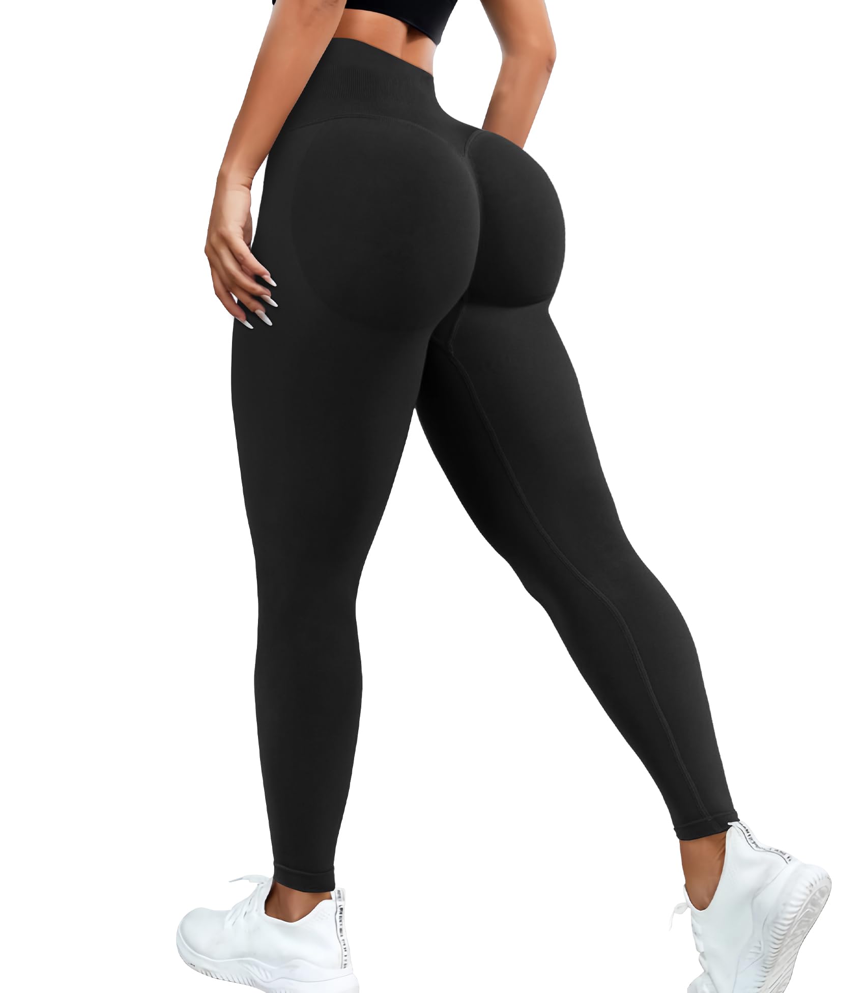 Black leggings worn by a person on a white background