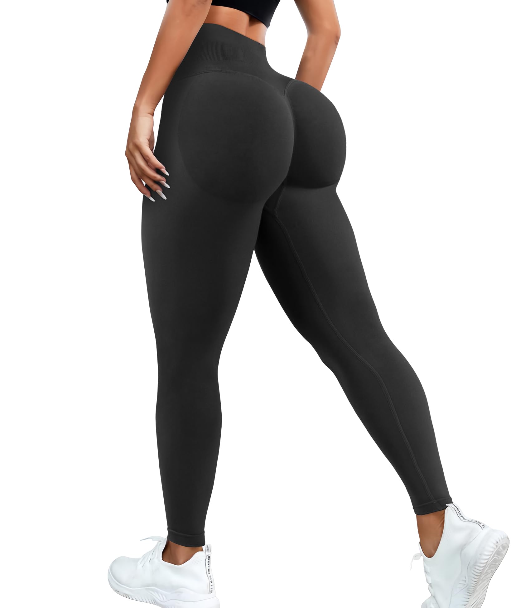 Black leggings worn by a person on a white background