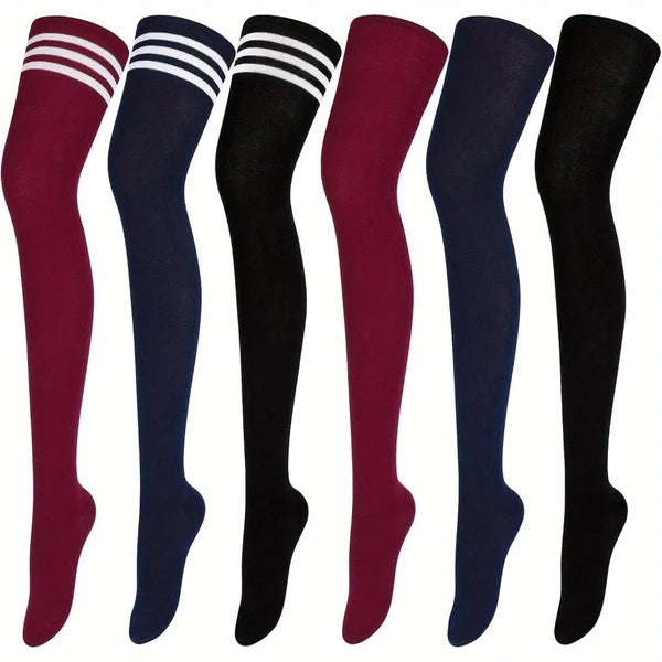 Set of six pairs of knee-high socks in red, blue, and black with white stripes on a white background.